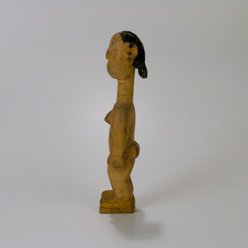 baule carved figure side view