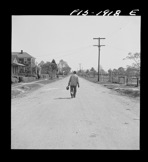 Negro shipyard worker leaving his rural home for the shipyards